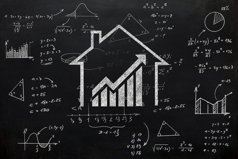 A sketch of a house and scientific formula on a blackboard
