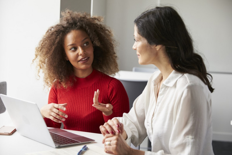 Career consultant talking to a client 