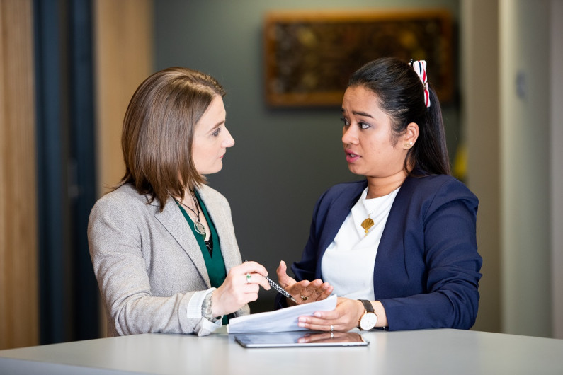 A career consultant speaks with a client